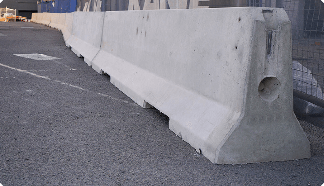 a concrete barrier on the road